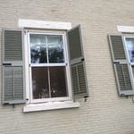 Rosslyn shutters loosened and flapping in the wind after July 19 thunderstorm.