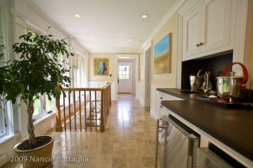 Rosslyn's bar and stairway to game room and wine cellar. (Credit: Nancie Battaglia)
