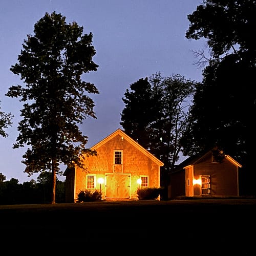 Predawn: carriage barn and icehouse (Source: Geo Davis) Predawn: carriage barn and icehouse (Source: Geo Davis)
