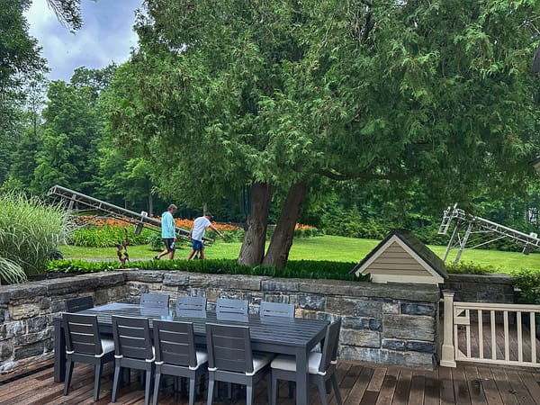 Glen, Tony, and Calvin Transport a Dock Section to Rosslyn’s Waterfront (Photo: Geo Davis)