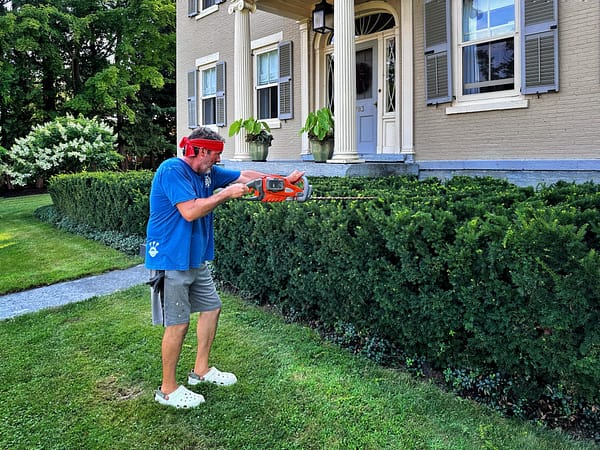 Glen Readying Rosslyn's Front Hedge (Photo: Geo Davis)