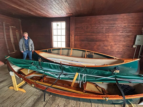 Ian Martin of Adirondack Guide Boat with custom rehab’ed Mad River Canoe rehabilitation (Photo: Glen Gehrkens)