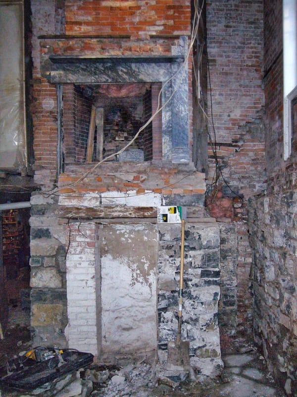 SE Corner of East Elevation with Plaster Parging (White) from Cistern, December 29, 2006 (Photo: Geo Davis)